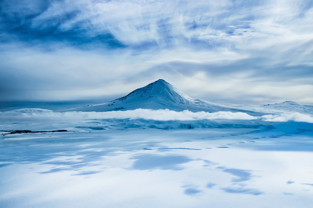 Mount Erebus in Antarctica sits in an icy landscape.