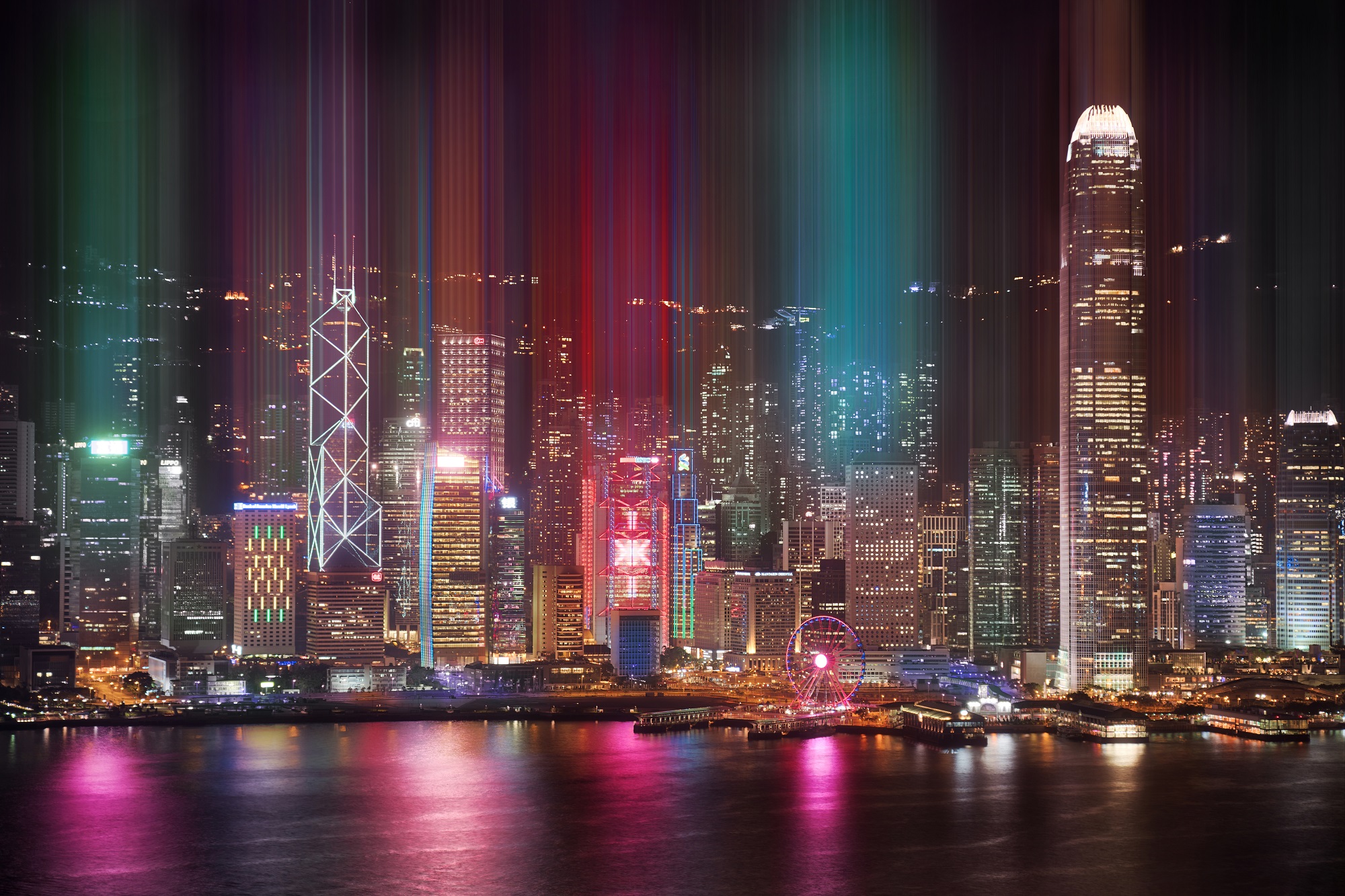 An image of the Hong Kong skyline at night from across the bay.